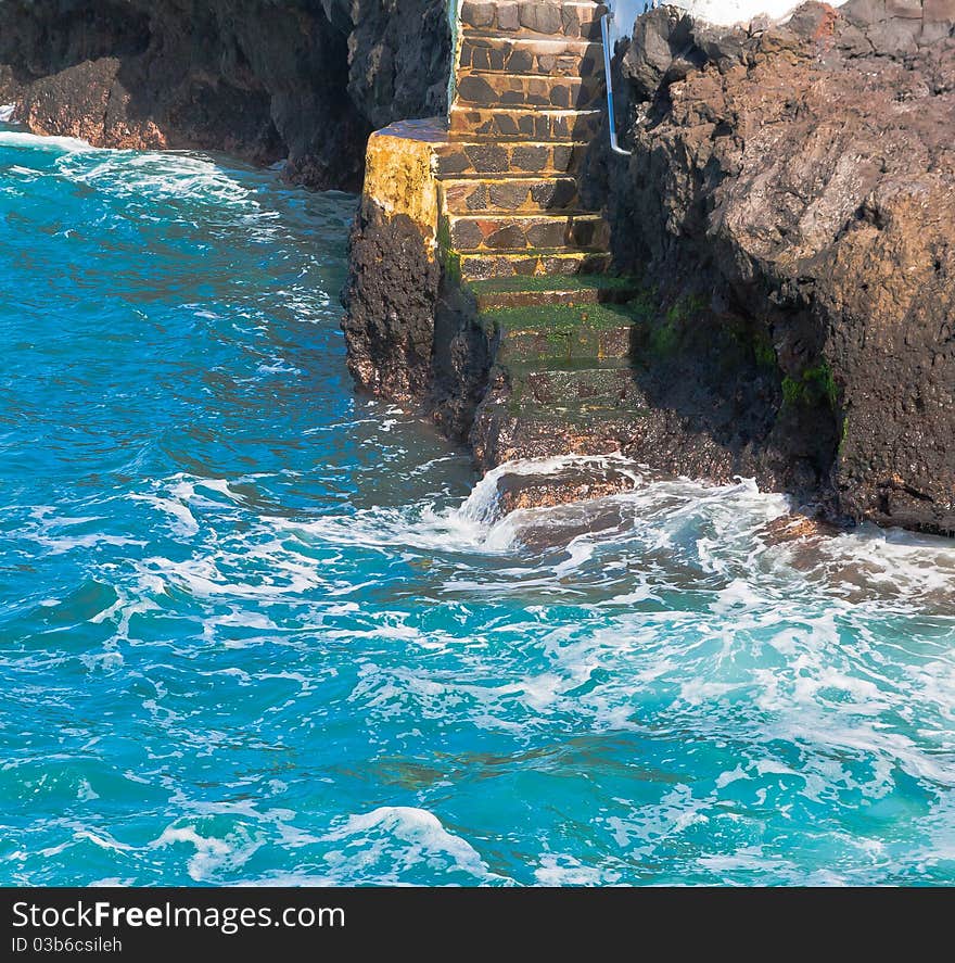 A view of steps with water on