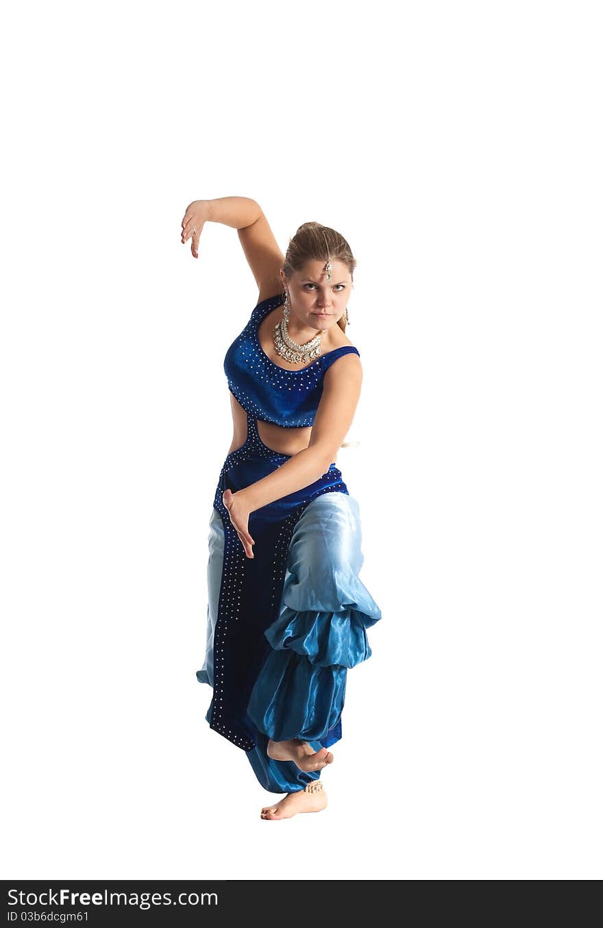 Young woman posing in arabia dance - traditional blue costume. Young woman posing in arabia dance - traditional blue costume