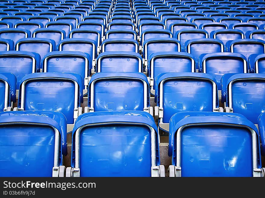 Rows of empty stadium seats