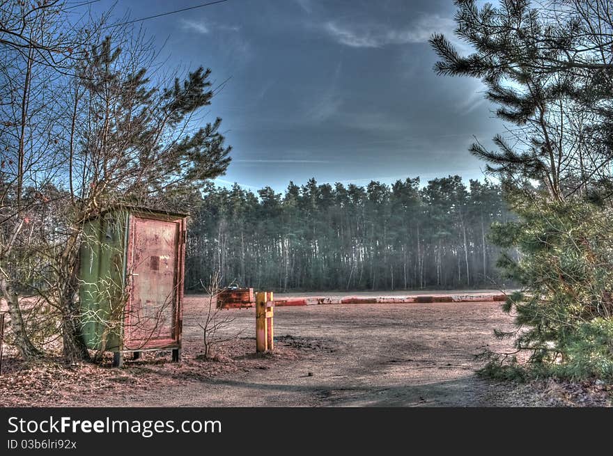 Rusted gateway to parking lot