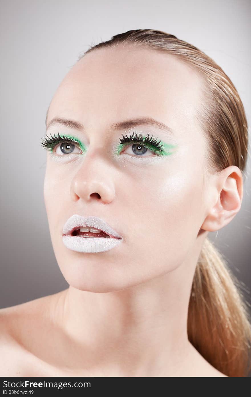 Beautiful Calm Woman Portrait Whith Green Make-up