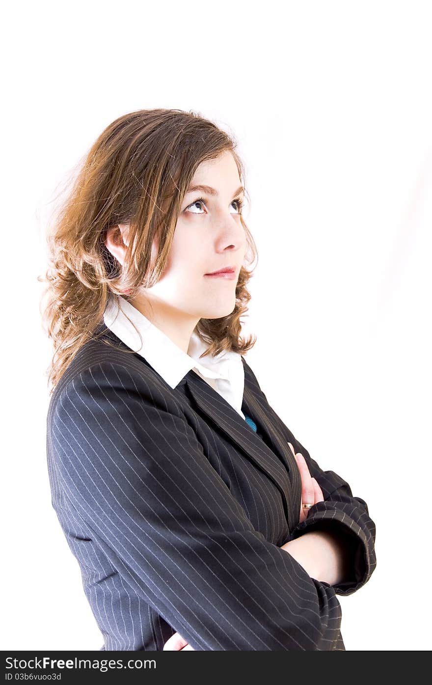 Young woman in suit looking up, isolated on white