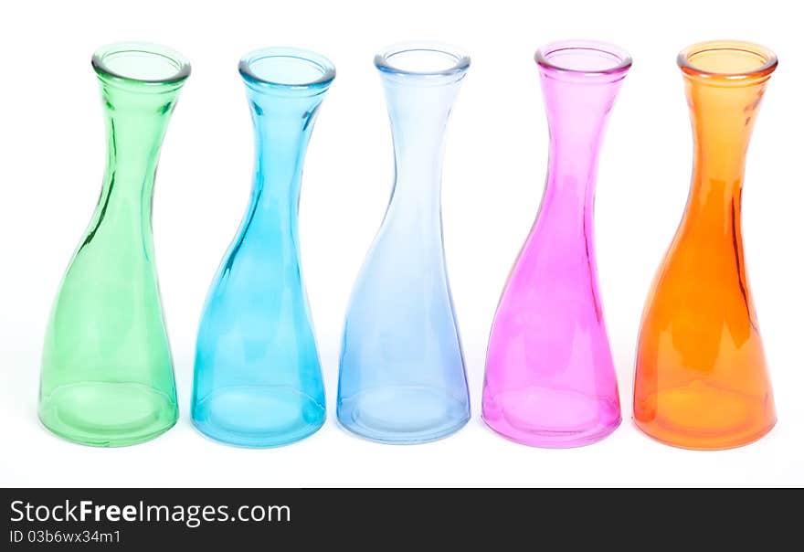 Glass color vases isolated on white background