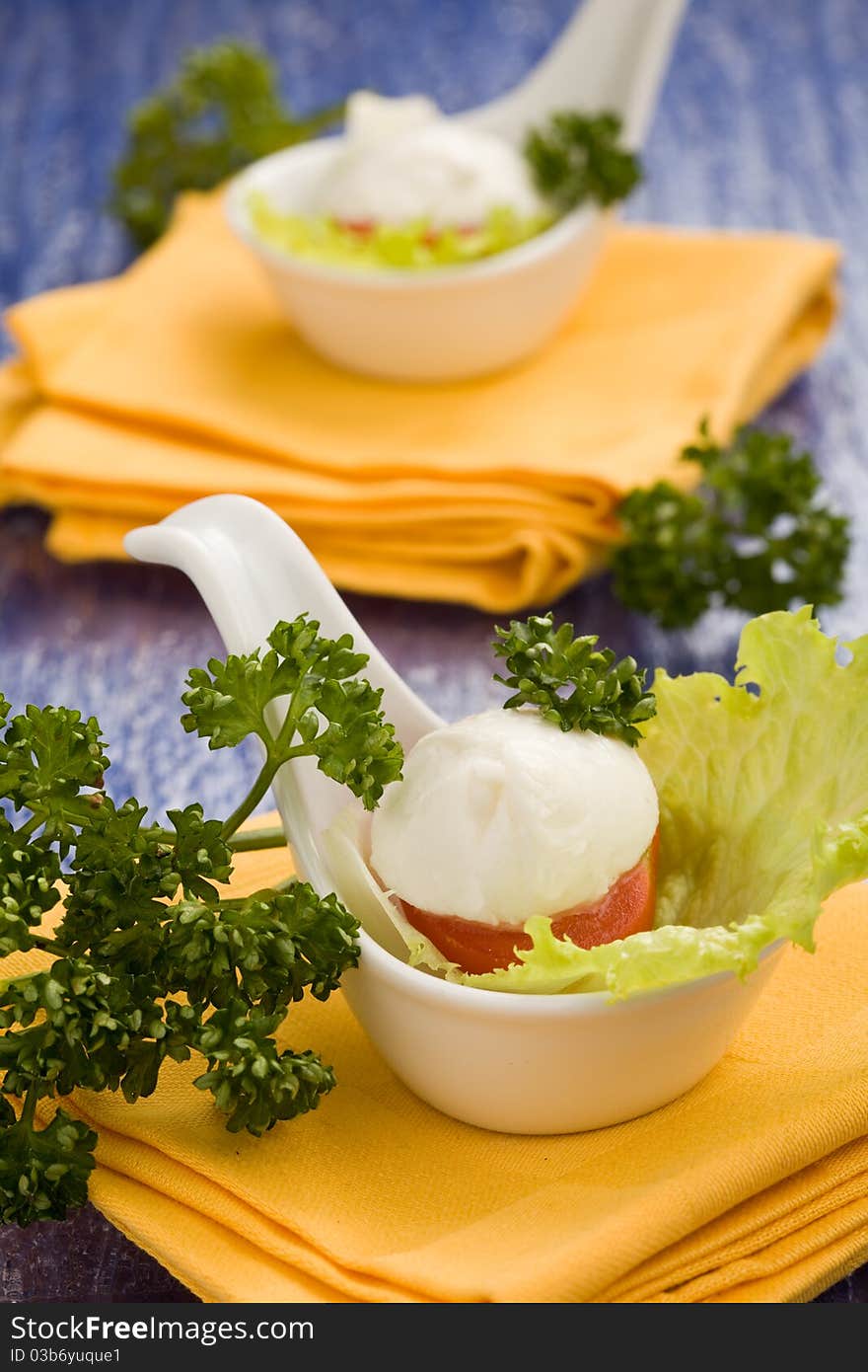 Spoon With Tomatoe And Mozzarella