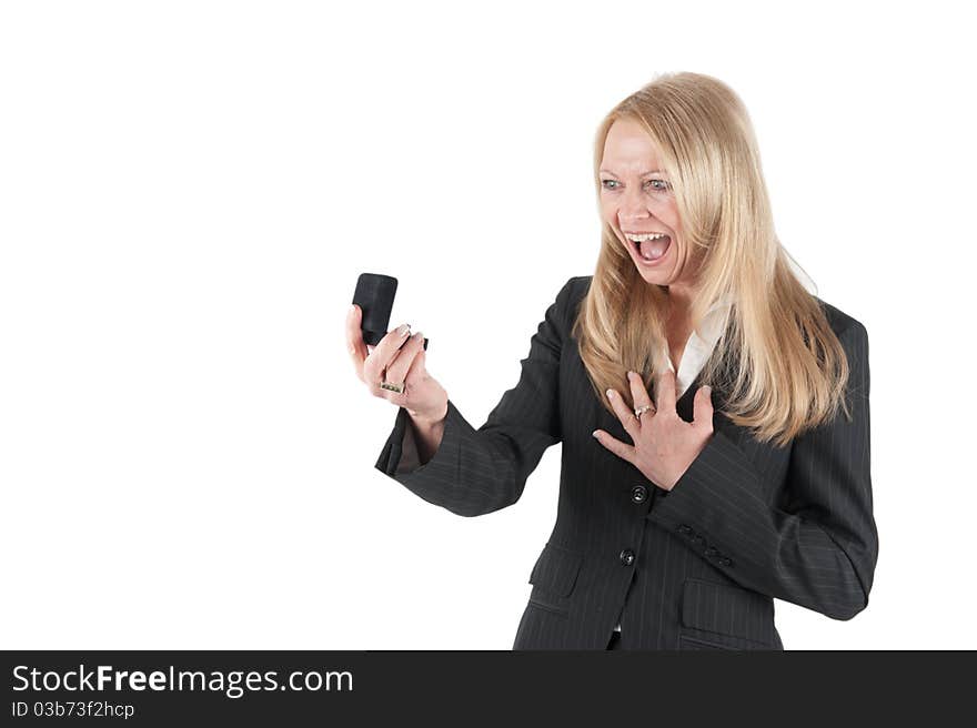 Lucky middle aged woman with a ring in a small box on isolated background. Lucky middle aged woman with a ring in a small box on isolated background