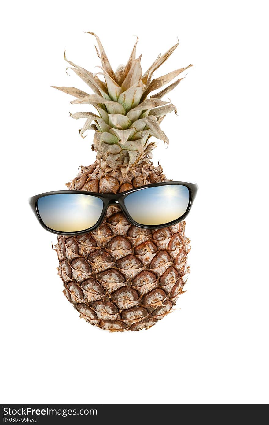 Pineapple as human head and sunglasses with color reflections. Pineapple as human head and sunglasses with color reflections