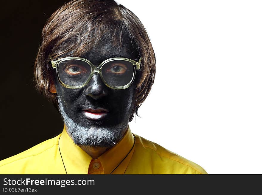 Portrait of a painted young man in studio. Portrait of a painted young man in studio