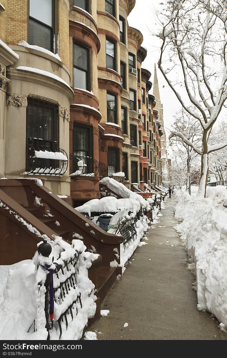 A block of rounded Brownstone apartments in the Park Slope neighborhood of Brooklyn, NY after January 2011 snowstorm. A block of rounded Brownstone apartments in the Park Slope neighborhood of Brooklyn, NY after January 2011 snowstorm.