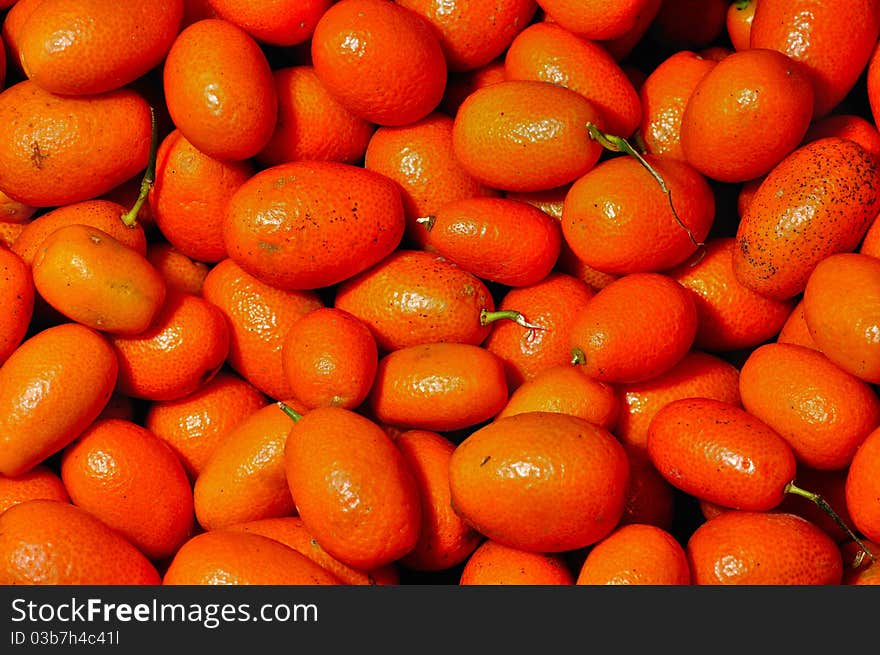 Kumquats in a fruit market. Kumquats in a fruit market