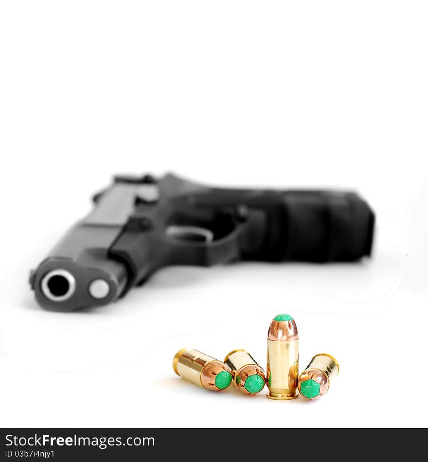 Closeup of tactical military bullets and gun on white background. Closeup of tactical military bullets and gun on white background