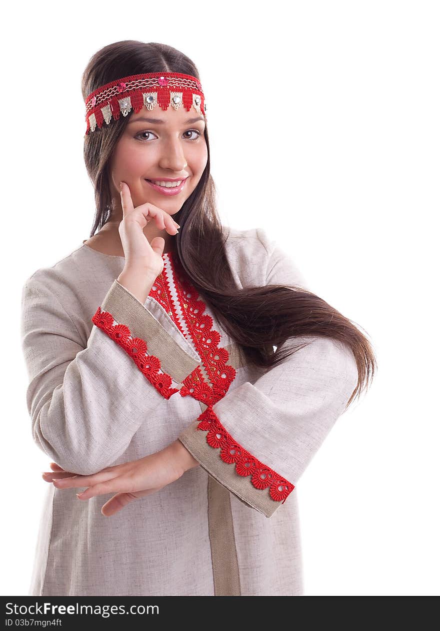 Young girl in dance pose - flax traditional russian costume. Young girl in dance pose - flax traditional russian costume