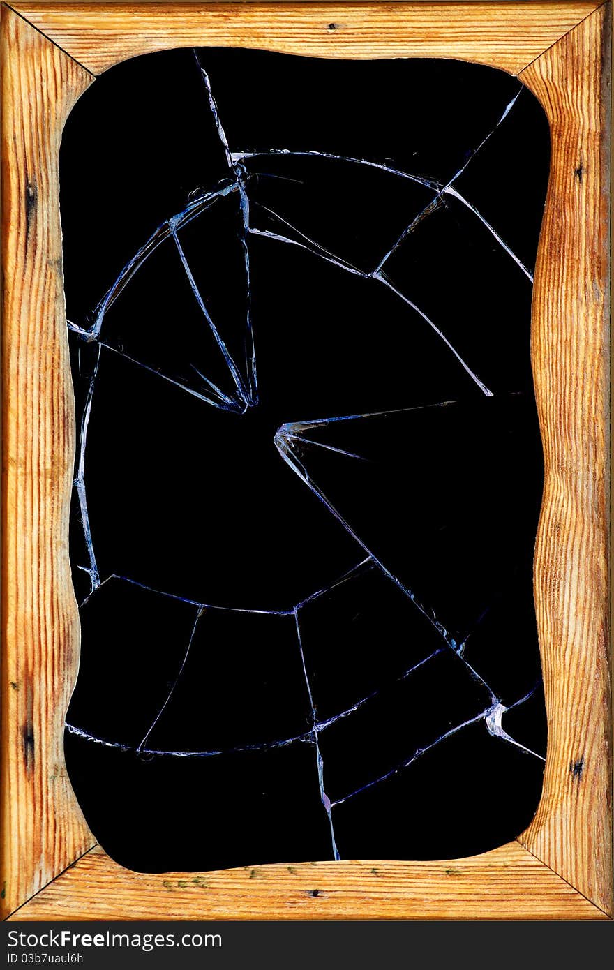 Cracks in the broken dark glass of a window. Cracks in the broken dark glass of a window