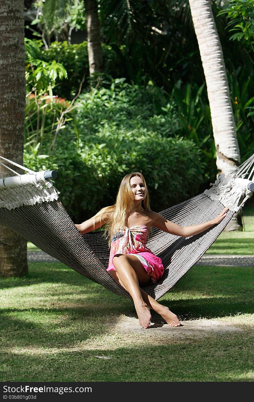 Beautiful Woman Resting On Natural Background