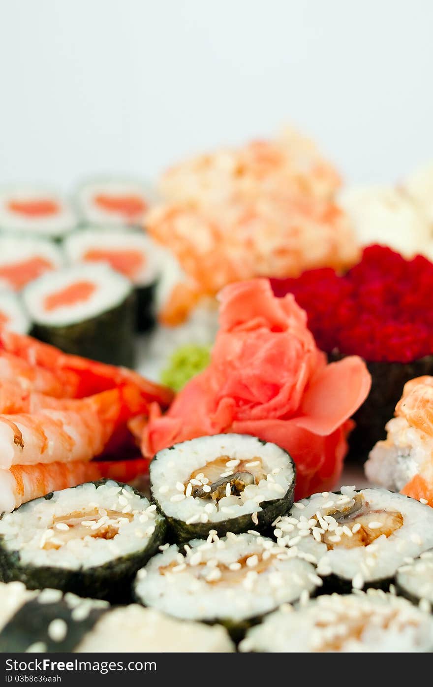 Plate with sushi and roll. Plate with sushi and roll