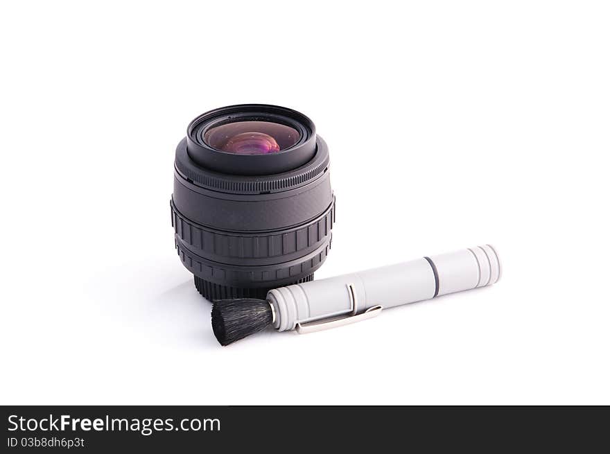 Dirty Lens with Cleaning Tool isolated on a white background