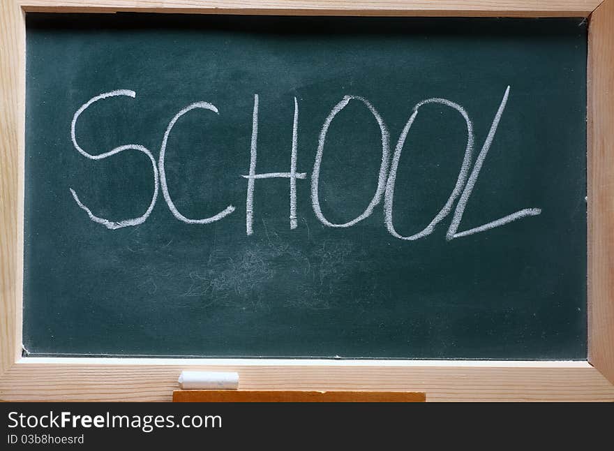 Isolated green blackboard close up