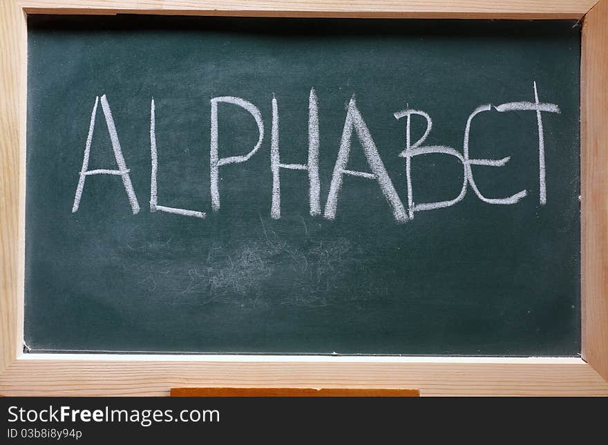 Isolated green blackboard close up