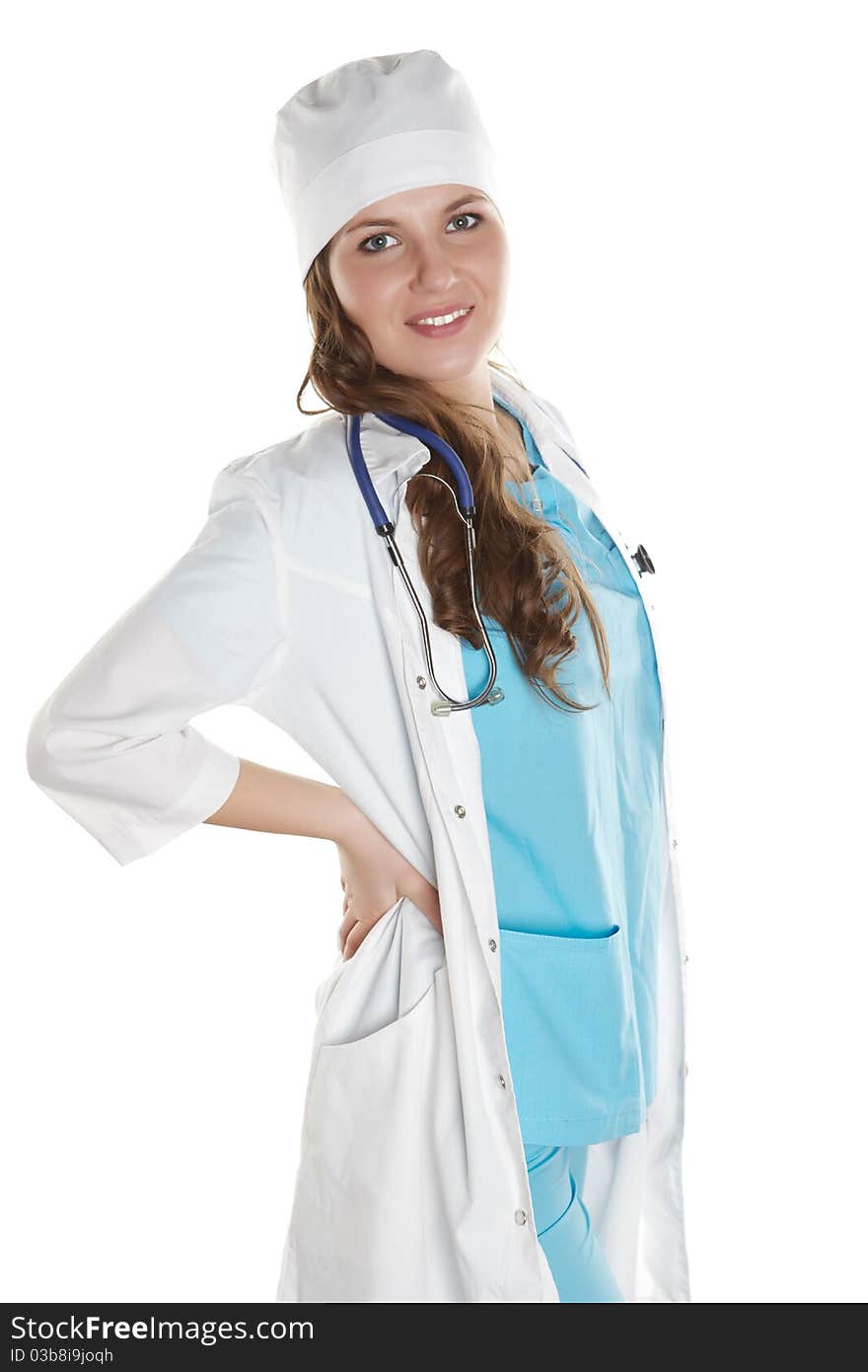 Portrait of a young doctor smiling in studio isolated on a white background. Portrait of a young doctor smiling in studio isolated on a white background