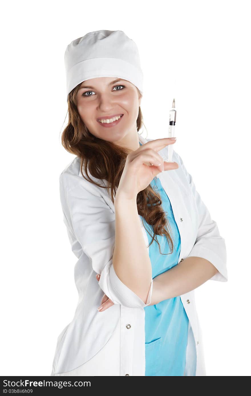 Portrait of a young doctor she smiling and looks into the camera and poses with syringe isolated on white background. Portrait of a young doctor she smiling and looks into the camera and poses with syringe isolated on white background