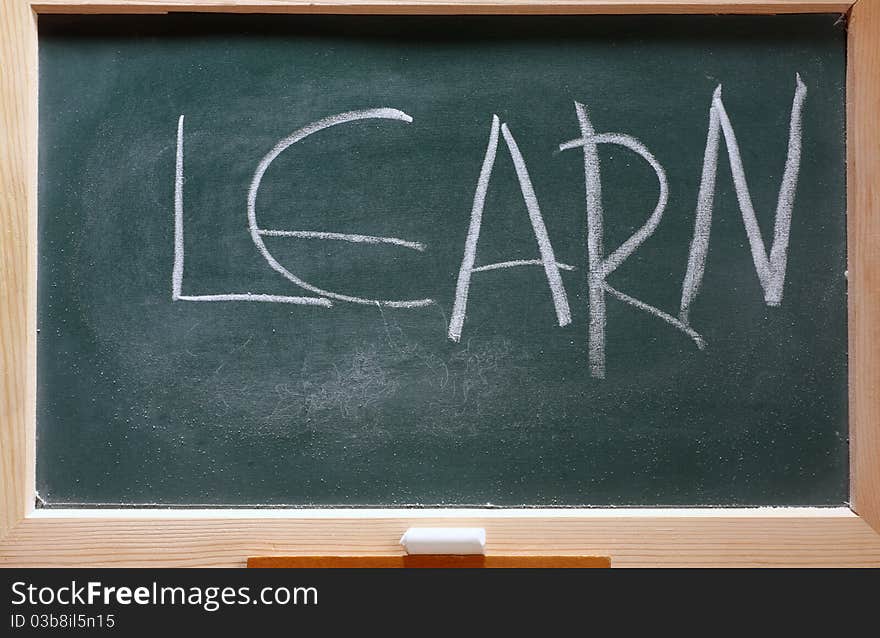 Isolated green blackboard close up