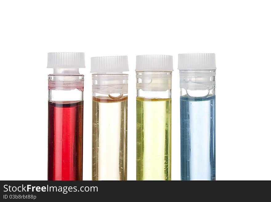 Test tubes with different liquids on a white background. Test tubes with different liquids on a white background.