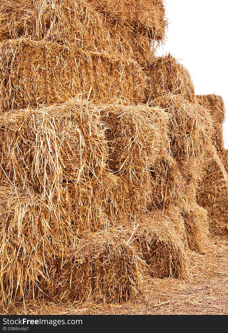 Pile of straw by product from rice field after collecting season. Pile of straw by product from rice field after collecting season.