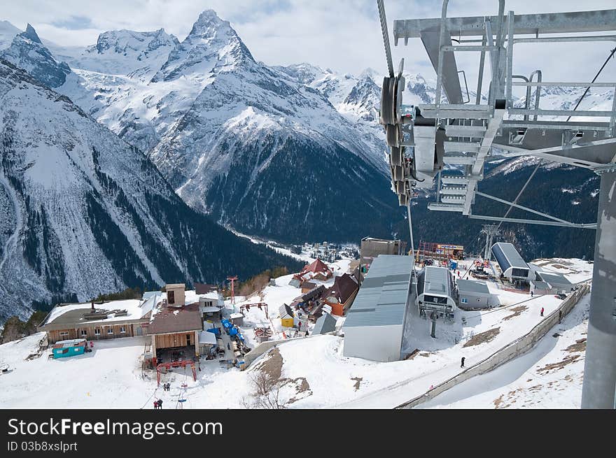 Rope-way on a mounting skiing resort in Russia. Settlement Dombai.The Caucasian mountains. Rope-way on a mounting skiing resort in Russia. Settlement Dombai.The Caucasian mountains.