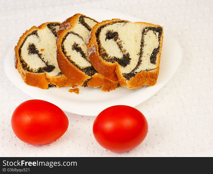 Eggs and sponge cake on white plate