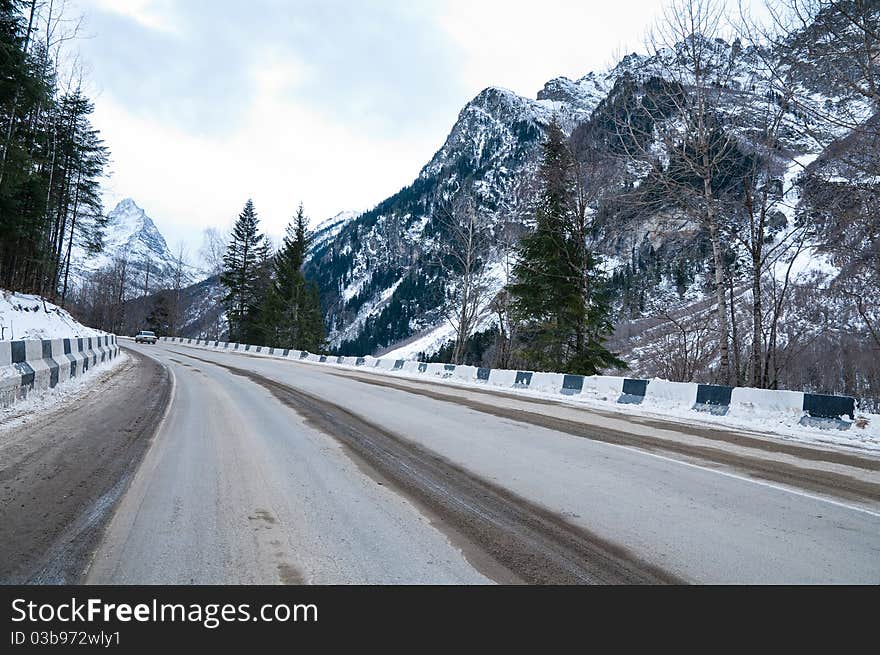 Road to mountains in the winter.