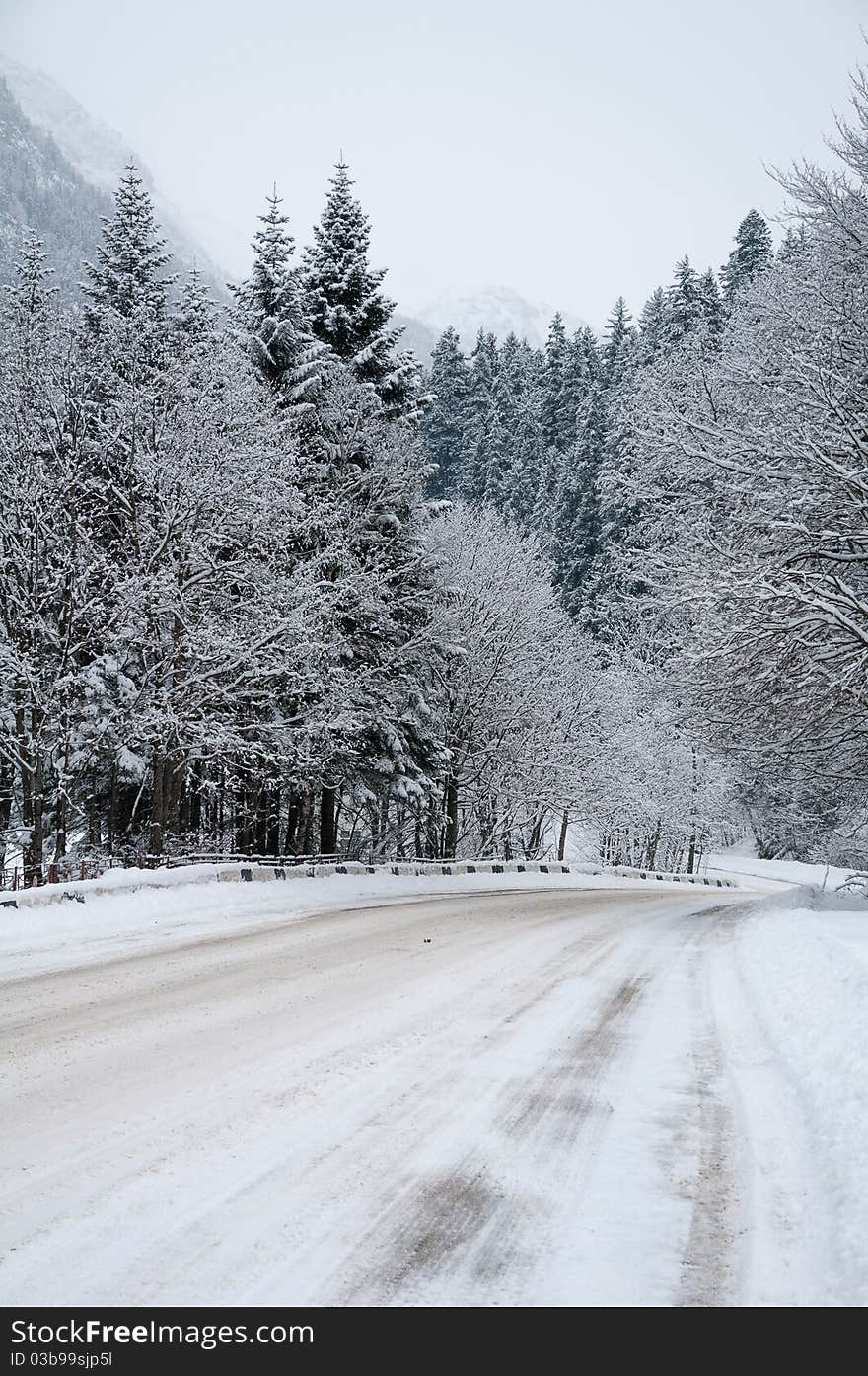 Road to mountains in the winter.