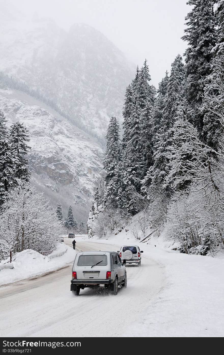 Road to mountains in the winter.