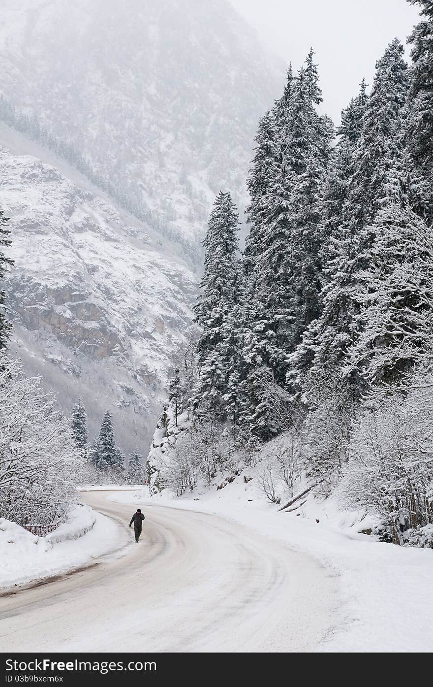 Road to mountains in the winter.