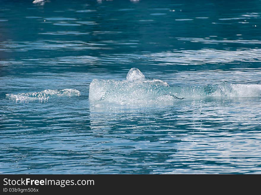 Icebergs and reflections on the Jokulsarlon lake in Iceland. Icebergs and reflections on the Jokulsarlon lake in Iceland