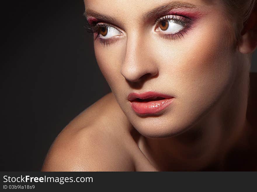 Beautiful Woman On Dark Background