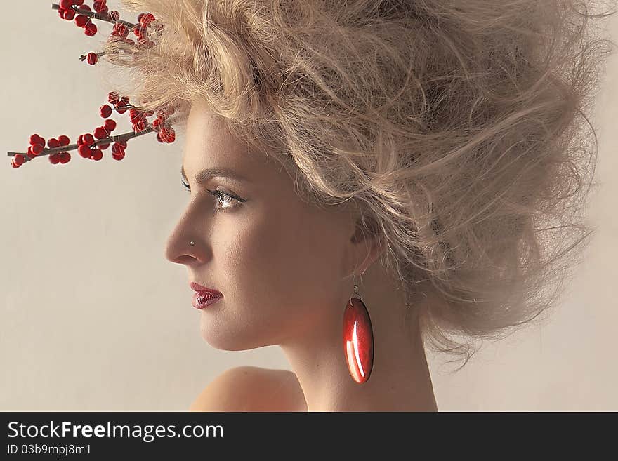 Portrait of a beautiful woman with an earring on a