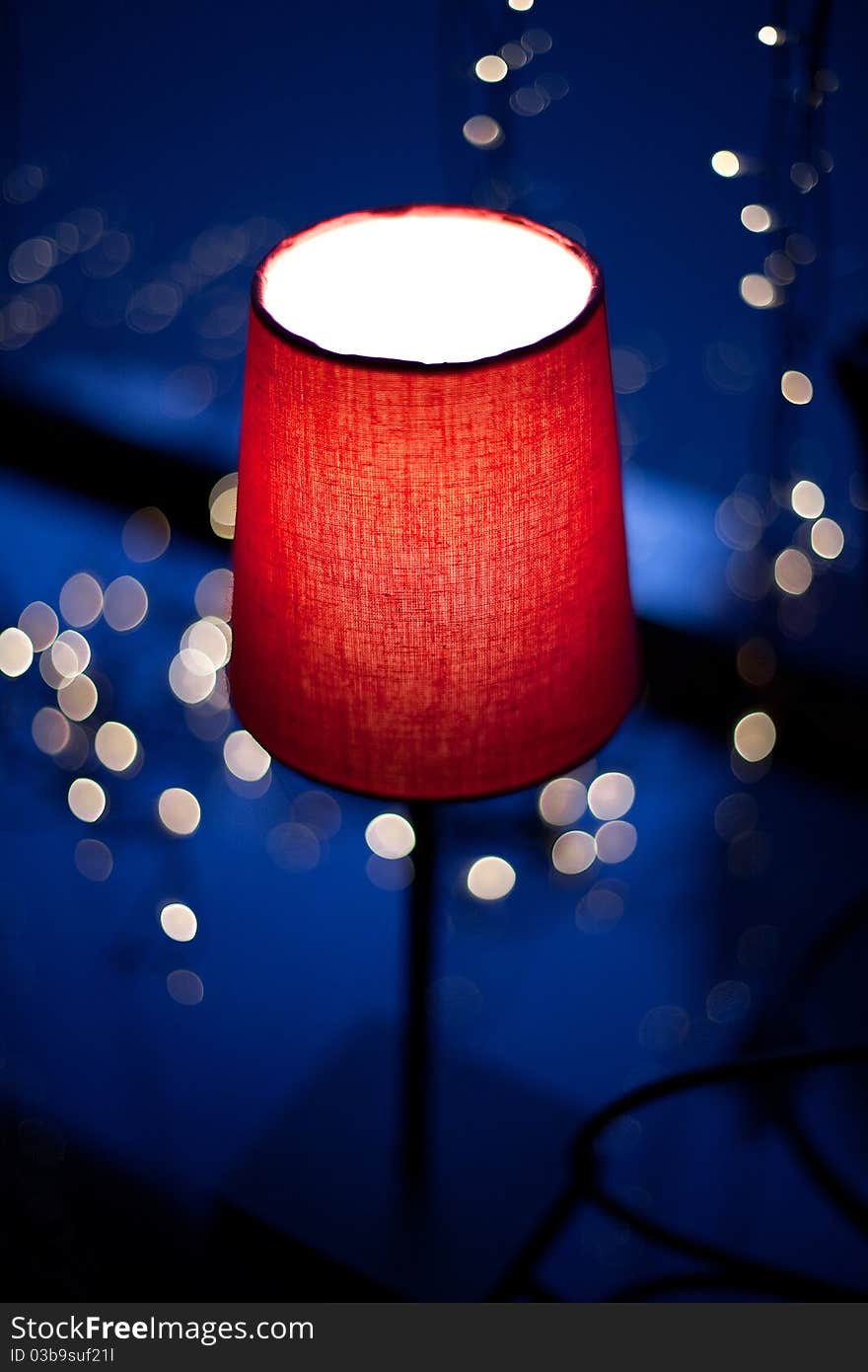 Red lamp in the darkness