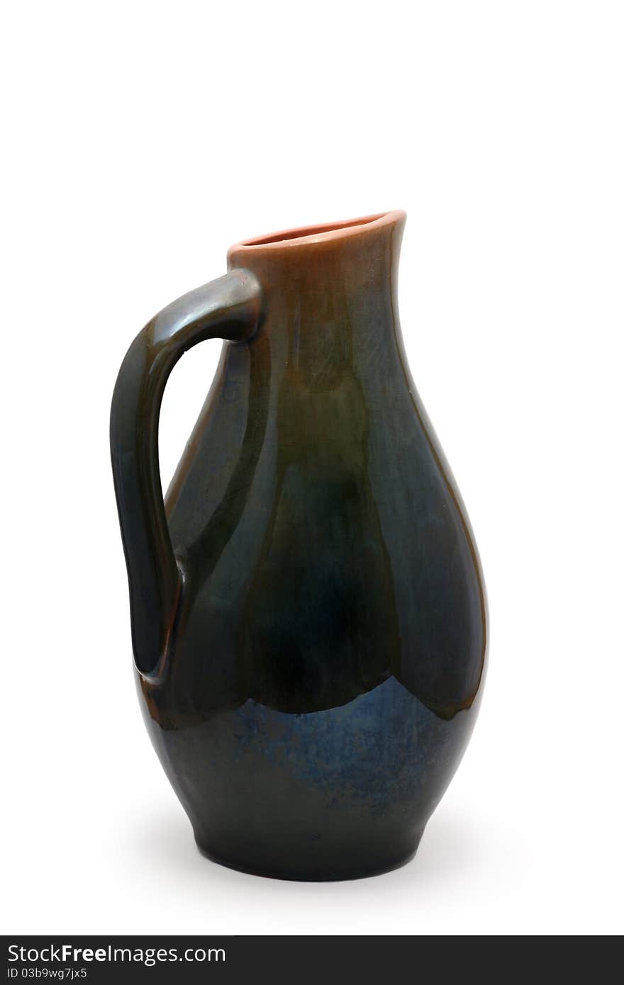 Photo of a clay jug for milk (isolated)