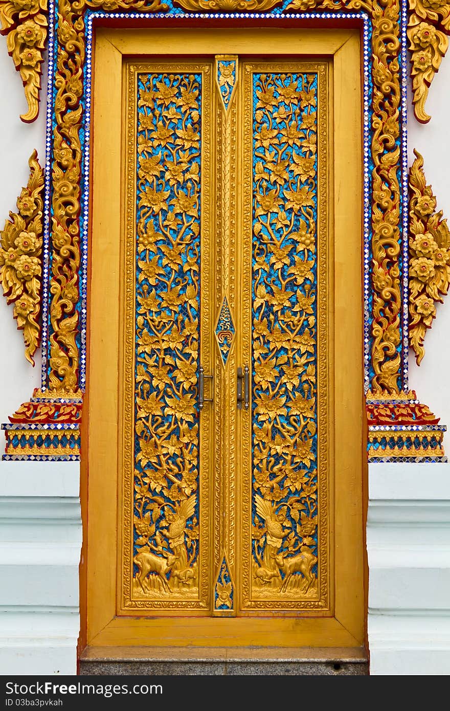 Traditional Thai style on door in temple Thailand