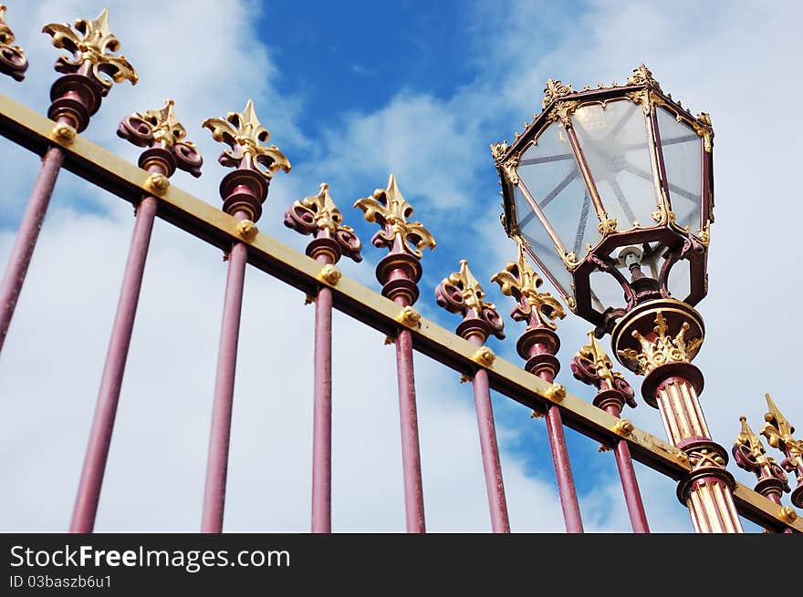 Decorative grille fence with lantern, Hofburg palace, Vienna. Decorative grille fence with lantern, Hofburg palace, Vienna