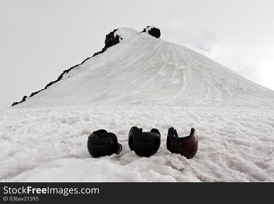 Three helmets atop a glacier in Iceland. Three helmets atop a glacier in Iceland