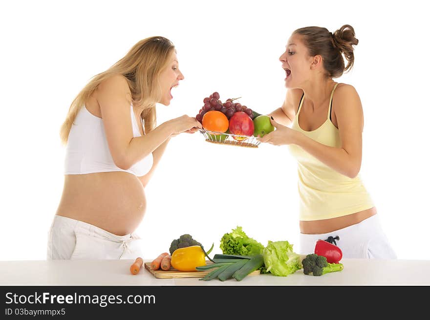 Two women squabbling over fruit