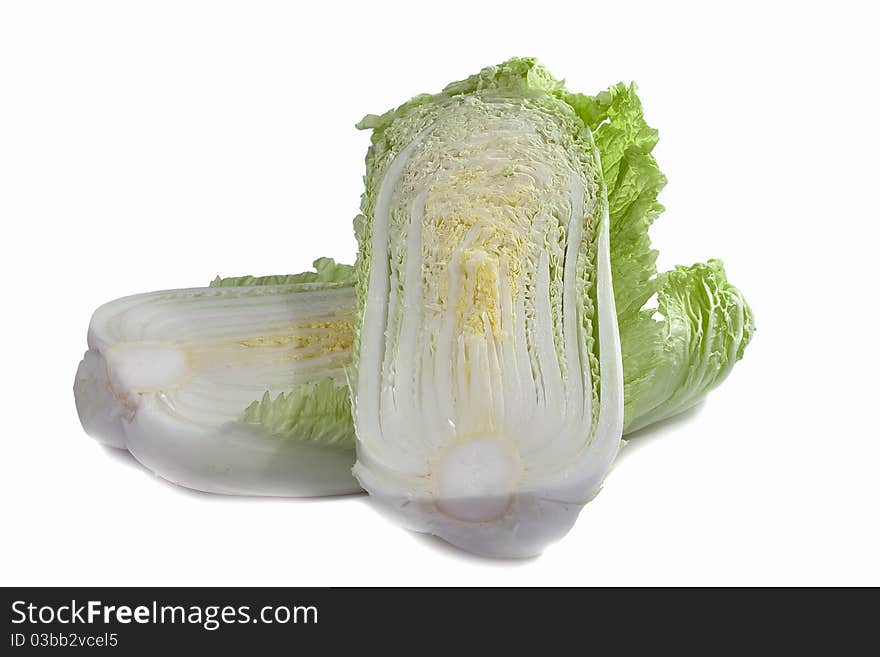 Cut half of the cabbage on a white background