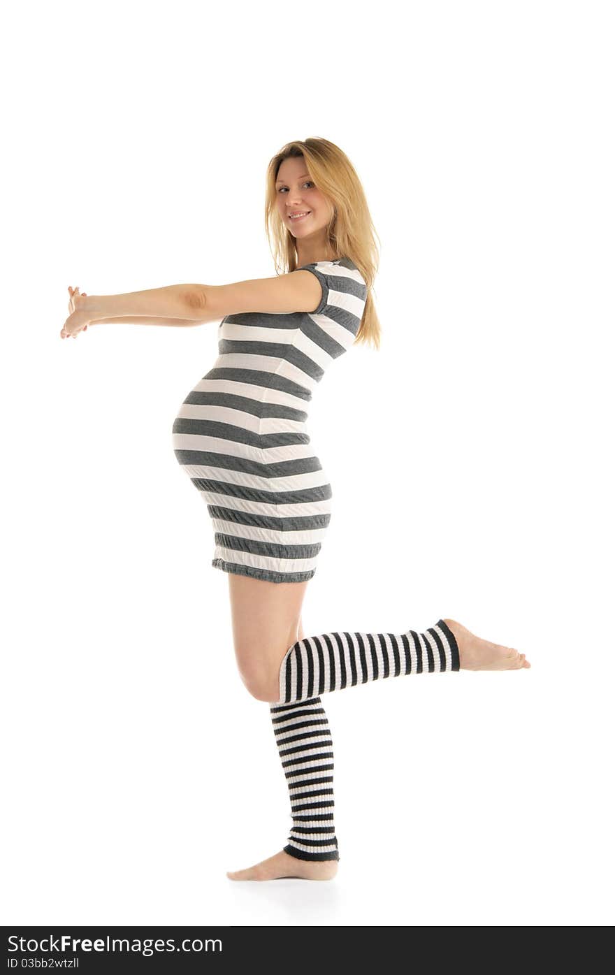 Happy Pregnant Woman In A Striped Dress