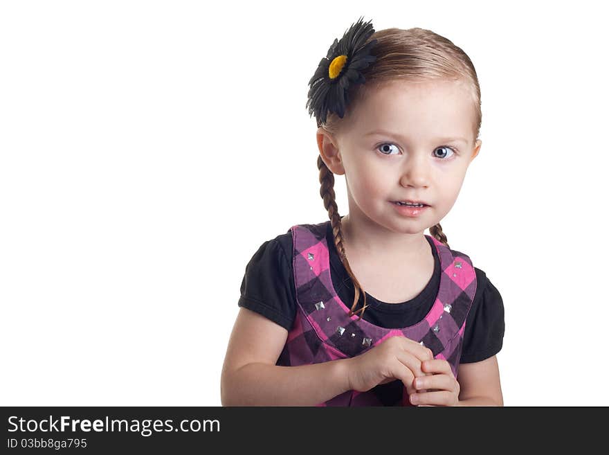 A young girl llok to see what is behind the viewer. Adorable eyes. A young girl llok to see what is behind the viewer. Adorable eyes.