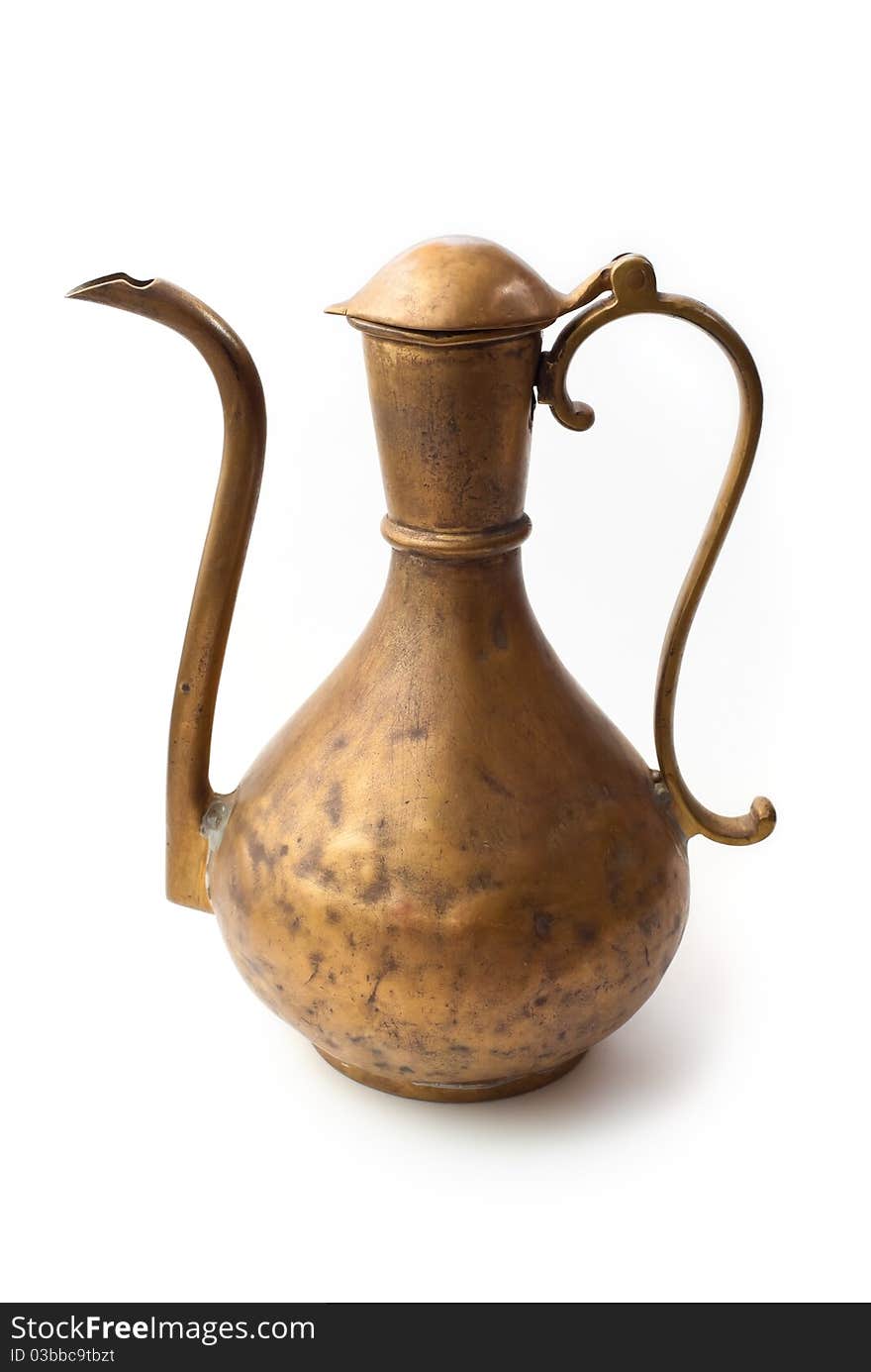 Old vintage vessel with long spout, isolated