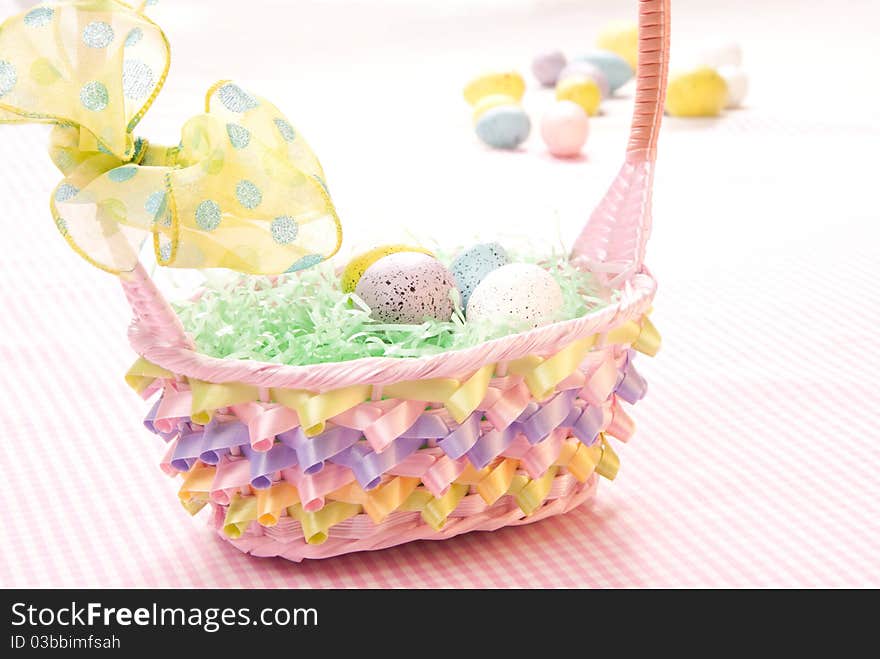 Easter colored eggs in basket. Easter colored eggs in basket