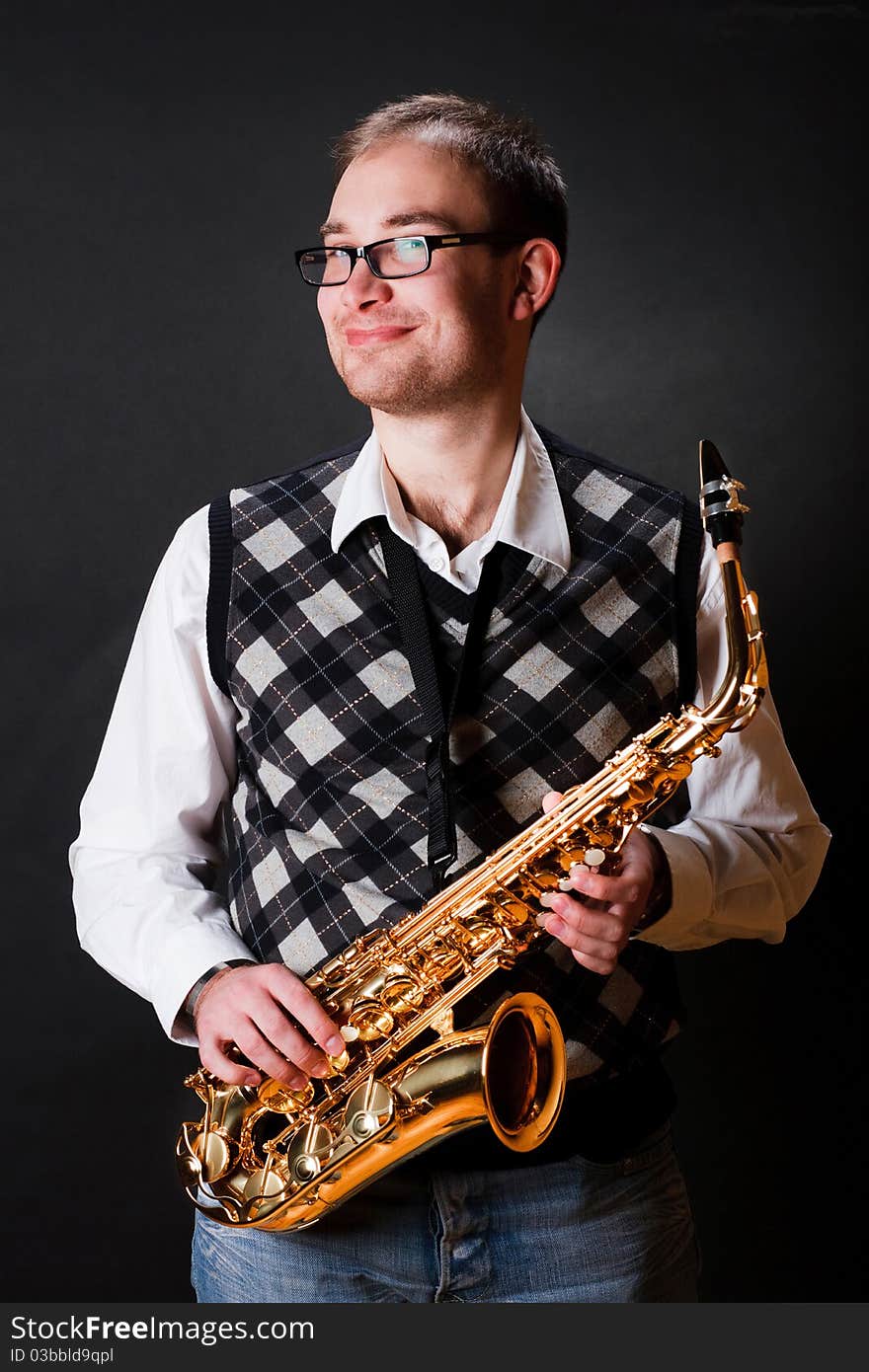 Portrait of a man with a saxophone