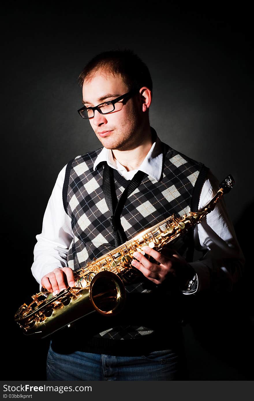 Portrait of a man with a saxophone