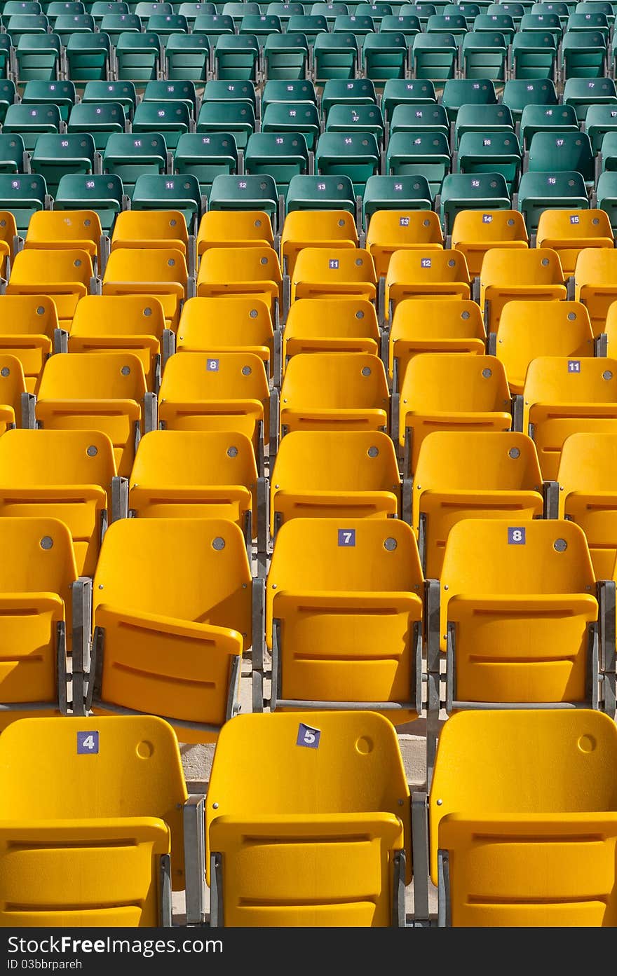 Empty Stadium Seats, with one broken.