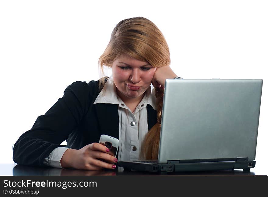 The businesswoman works at the computer at office